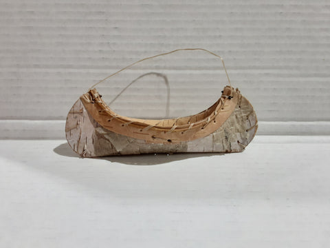 Birchbark  canoes hanging